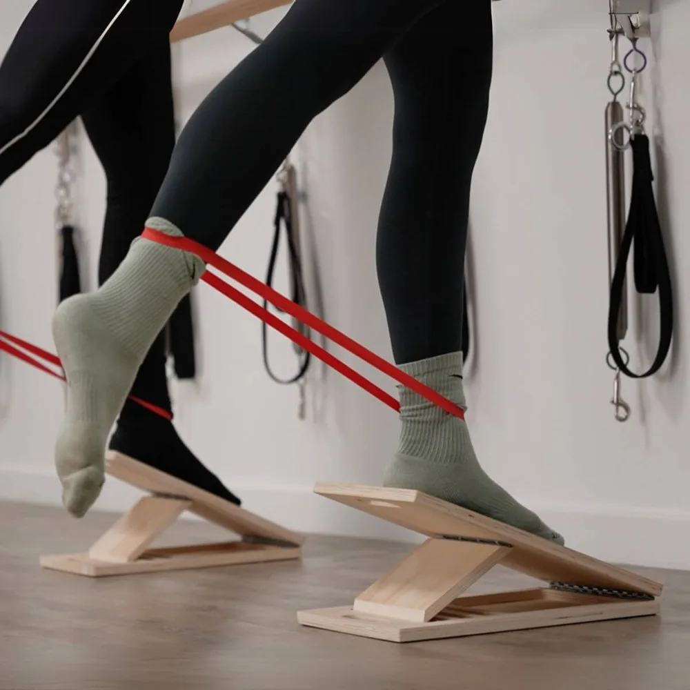 Slant boards and resistance bands in a CORE sculpt class