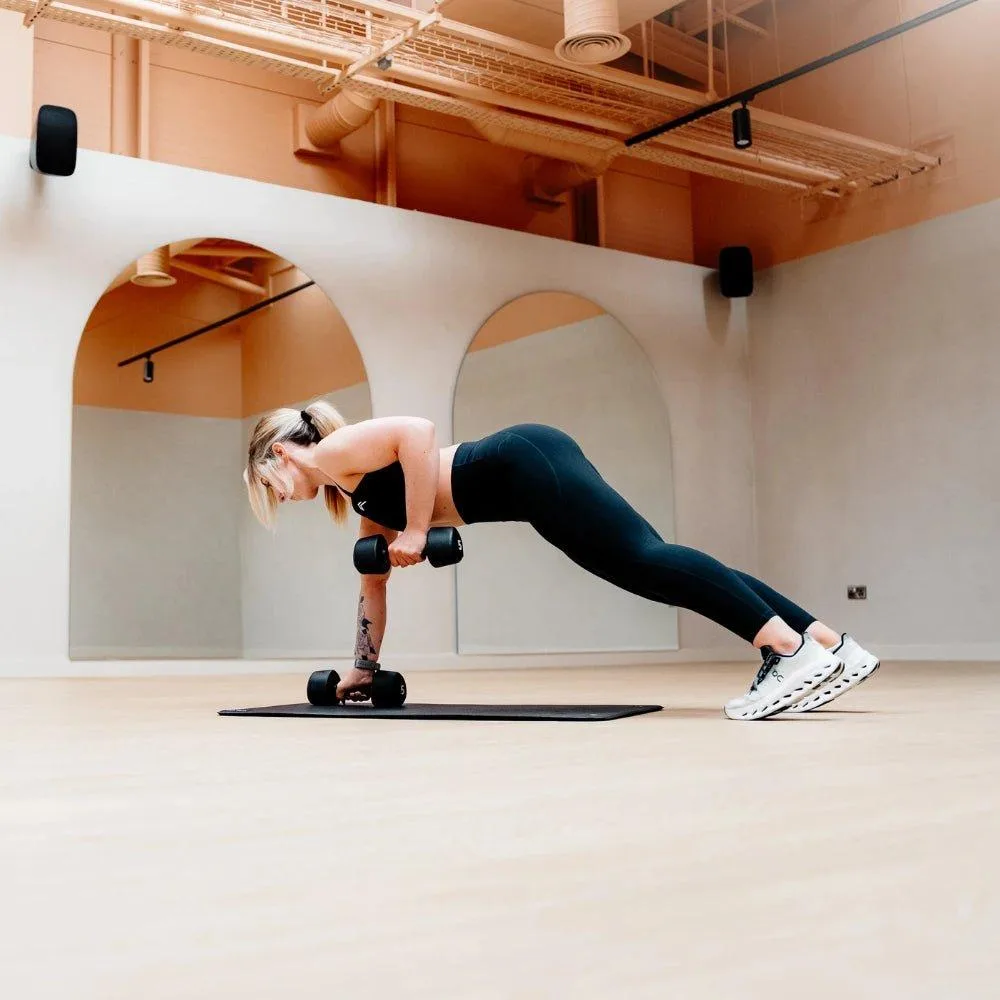 A controlled mat plank combined with a light dumbbell row